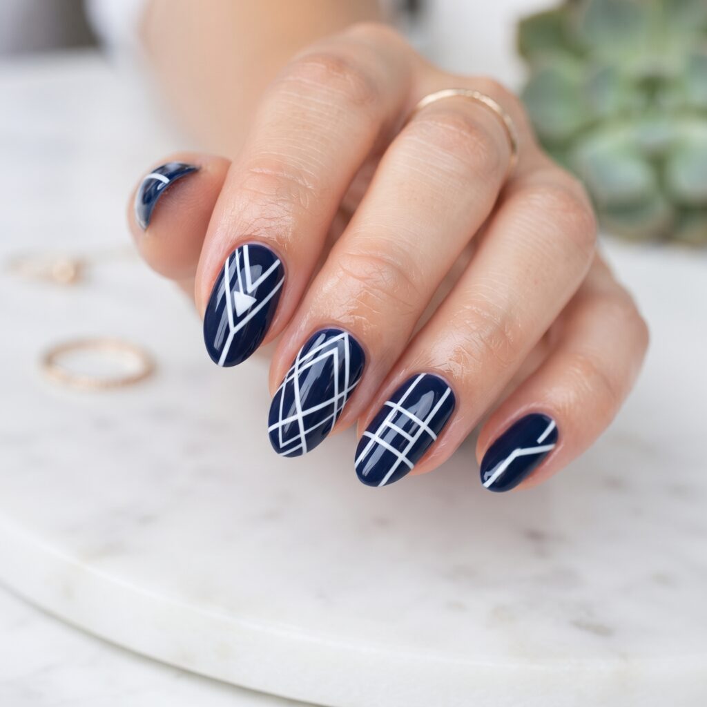 Dark Blue Nails Ideas: 30 Stunning Looks to Inspire Your Next Manicure 17 Geometric Dark Blue Nails Idea